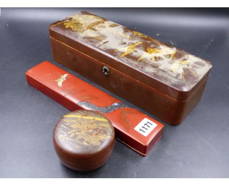 A JAPANESE LACQUER SCROLL BOX.   W.30.5cms, A BUN SHAPED BOX  WITH A BROWN GROUND.   Dia.8.5cms AND A RED GROUND CHOPSTICK BO