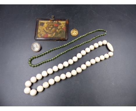A GREENSTONE BEAD NECKLACE, ANOTHER IN BONE, A PORTRAIT MINIATURE BROOCH, A GILT MEDALLION AND A TORTOISESHELL MOUNTED HAND C