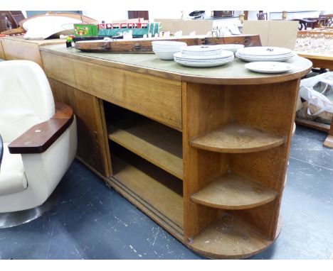 AN ART DECO OAK KITCHEN SIDE CABINET/ ROOM DIVIDER WITH SLIDING DOORS, DRAWERS AND OPEN END SHELVES.   L.185 x W.65 x H.91cms