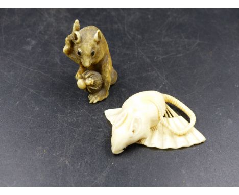 A CARVED MARINE IVORY NETSUKE OF A RAT ON AN OPEN FAN.   W.5cms TOGETHER WITH AN IVORY SQUIRREL ALARMED BY A GIANT SPIDER ON 