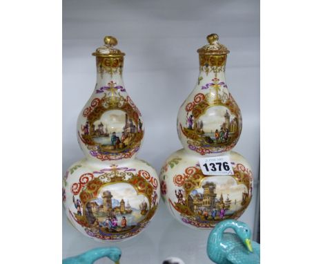 A PAIR OF GERMAN DRESDEN DOUBLE GOURD VASES AND COVERS, PAINTED WITH PAIRS OF HEROLDT STYLE PORT SCENE RESERVES TO EACH SIDE,