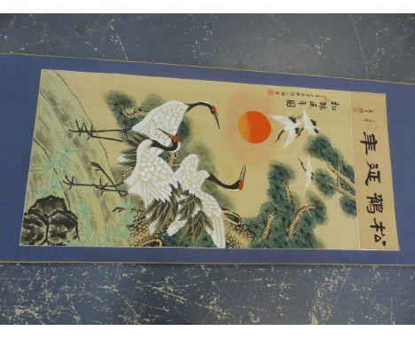 A CHINESE SCROLL PAINTING OF CRANES, SIGNED WITH CHARACTERS AND SEAL MARKS.   IMAGE  123 x 57cms.