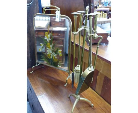 AN ARTS AND CRAFTS BRASS FIRESIDE COMPANION SET AND A MIRROR INSET FIRESCREEN.