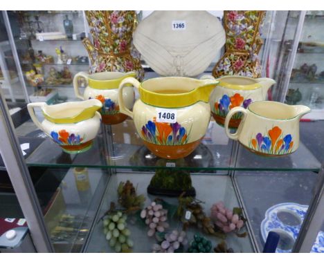 NEWPORT AND WILKINSON POTTERIES CLARICE CLIFF BIZARRE CROCUS PATTERN.   FIVE VARIOUS LARGE CREAM JUGS.  (5)