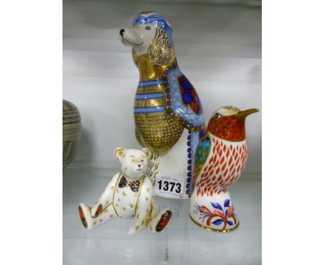 A GROUP OF THREE ROYAL CROWN DERBY PAPERWEIGHTS TO INCLUDE A KINGFISHER , A BEAR AND A POODLE. 