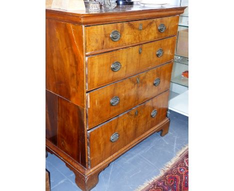 AN 18th.C.AND LATER WALNUT AND INLAID COTTAGE CHEST OF FOUR GRADUATED DRAWERS ON BRACKET FEET.   W.99 x H.107 x D.56cms.