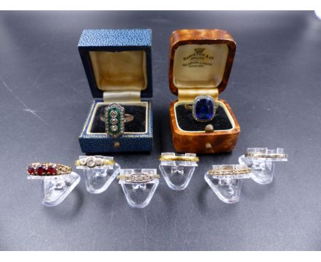 EIGHT VARIOUS RINGS TO INCLUDE AN 18ct DIAMOND THREE STONE, A 22ct WEDDING BAND, TWO VINTAGE 9ct EXAMPLES, TWO FULL ETERNITY 