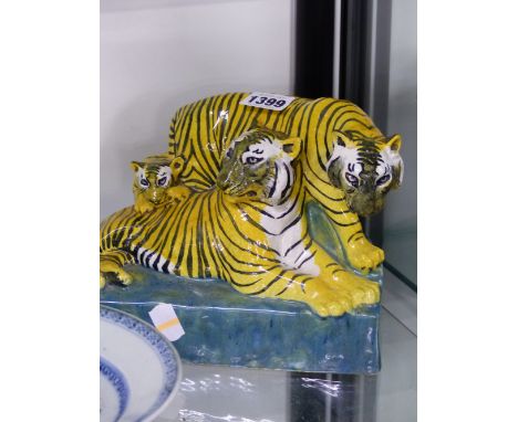 AN ART POTTERY FIGURE GROUP OF A FAMILY OF TIGERS, SIGNED TO BASE STELLA R.CROFTS.   W.22cms.