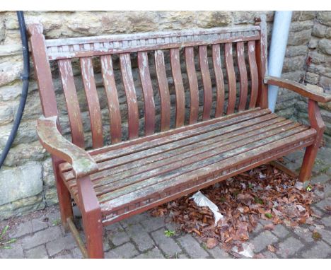 A HARDWOOD GARDEN BENCH.