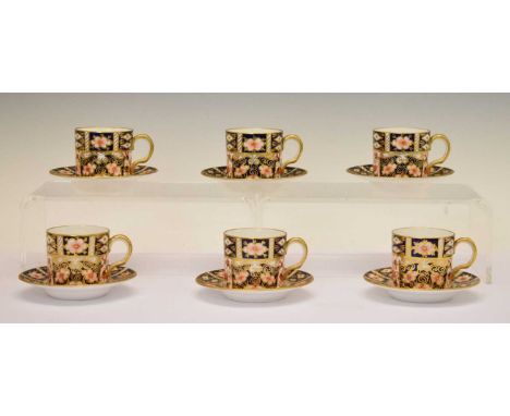 Six Royal Crown Derby Imari coffee cans and saucers, printed and painted marks