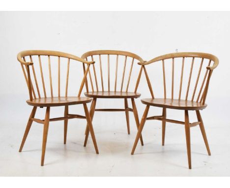 Three Ercol light elm Model 338 fireside elbow chairs