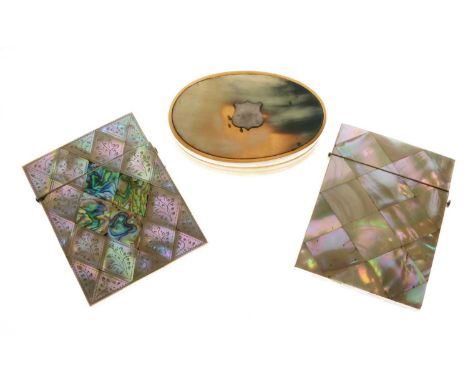 Two Victorian mother-of-pearl visiting card cases, one with abalone shell panel, 10cm high, and a 19th Century horn oval tabl