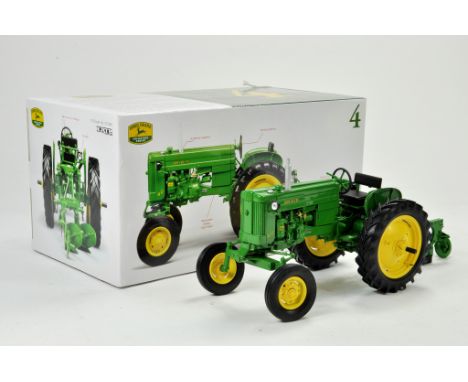 Ertl Collector Edition 1/16 John Deere Model 40 Tractor with Plough. Has been on display, otherwise appears excellent with or