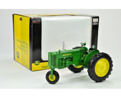 Spec Cast 1/16 John Deere MT Gas Tricycle Tractor. Has been on display but appears excellent with original box.