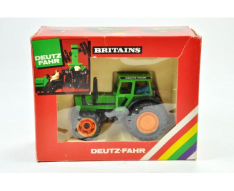 Britains 1/32 Farm issue comprising Deutz DX92 Dual Wheel Tractor. Excellent, box has some minor storage wear.