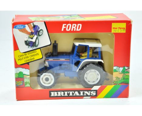 Britains 1/32 Farm issue comprising Ford 5610 tractor. Excellent, box has minor storage wear.