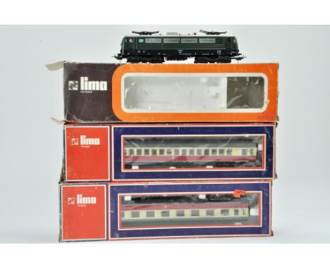 A trio of Lima 00 Gauge Model Railway issues comprising of two coaches and one locomotive.  Appears good. Some boxes have sto