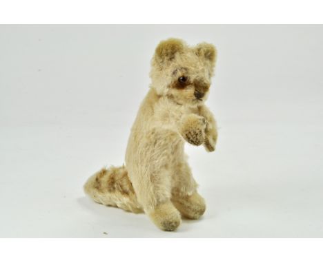 Steiff Original 1950's Germany Mohair Raccy The Raccoon.  He is 6" tall and has a rotating head. In very good to excellent co