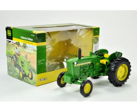 Ertl Collector Edition 1/16 John Deere 1010 Tractor. Has been on display, otherwise appears excellent with original box.