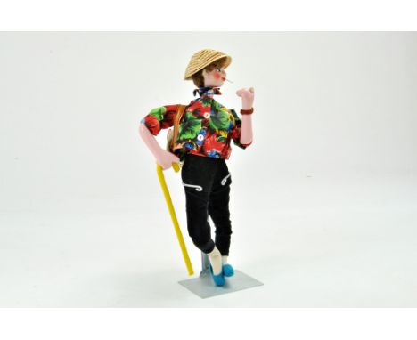 Vintage 1950's Roldan Klumpe Hiker Smoker Doll. Wearing Black velvet trousers, floral shirt, pearl earrings, rucksack with ru