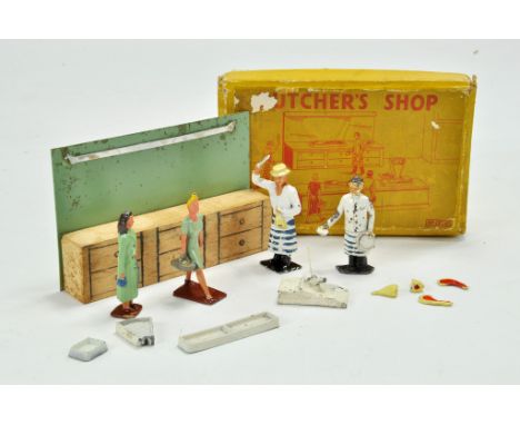 Crescent No. 1230 Butchers Shop with 4 figures and accessories. Some attention required to weighing scales otherwise good in 
