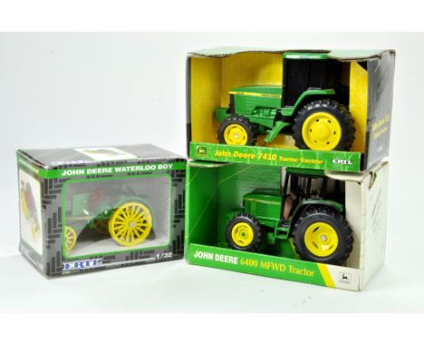 Ertl Trio of 1/32 Farm Tractor issues comprising John Deere Waterloo Boy, 7410 and 6400. All generally excellent with boxes.