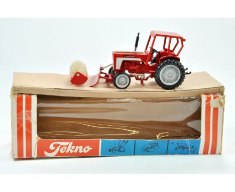 Tekno International Tractor with Front Yard Brush. Scarce item is generally excellent, box has some notable storage wear.