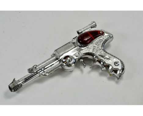 Lone Star Impressive Space Outlaw Toy Atomic Gun. Bright chrome example is well preserved. Mechanisms all appear still functi