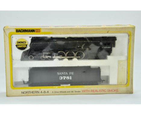 Bachmann 00 Gauge Model Railway issue comprising of Northern locomotive with realistic smoke. Item no. 660 - Sante Fe. Appear