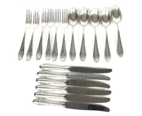 A German silver part service of flatware comprising five table spoons, six table forks and six knives, weighable silver 766gm