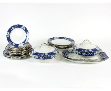 A Copeland Spode dinner service of twenty-eight pieces, the border decorated prunus blossom