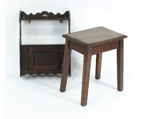 An oak side table, the single drawer with swing handle, on square tapered legs, 76.5cm wide, a small oak stool and a wall she