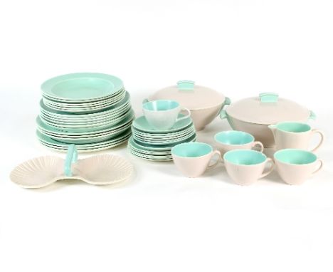 A Poole pottery part breakfast service of forty pieces, green and pink glazed