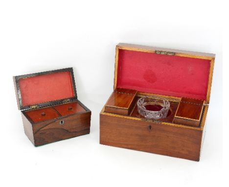 A Georgian mahogany tea caddy, of rectangular form with satinwood stringing, fitted two hinged canisters flanking a later cut