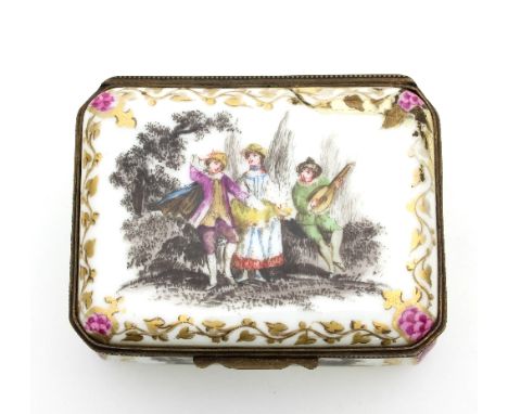 A German porcelain box, 19th Century, the cover decorated musicians within a border of gilt foliate trails, the sides similar