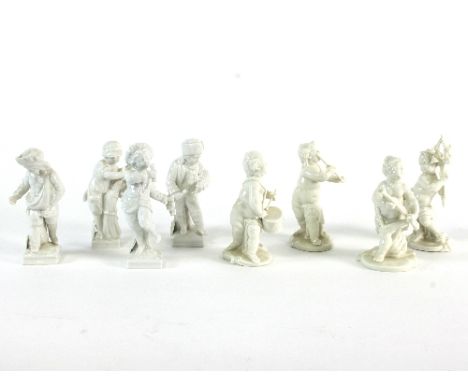 Four white glazed KPM figures, the four seasons, 11cm high and four Nymphenburg white glazed figures of musical putti, 12cm h
