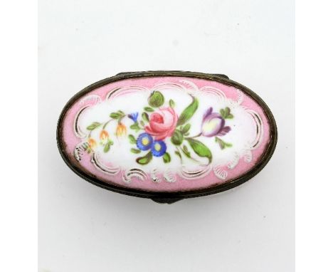 A Bilston enamel box, the oval top and sides decorated reserves of flowers within raised white scroll borders to a pink groun