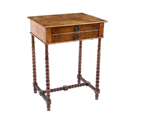 An 18th Century walnut work table fitted two drawers, on bobbin turned supports, 58cm wide