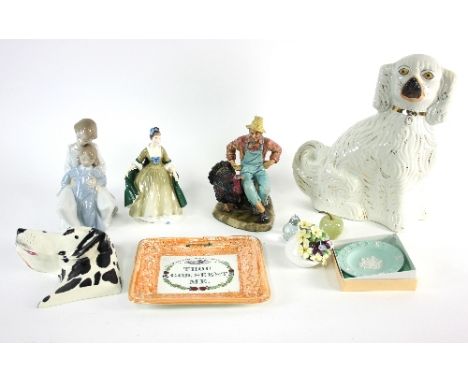 A lustreware plaque, 'Thou God See'st Me' with orange border, a Staffordshire dog, a Nao porcelain figure, a Crown Devon mode