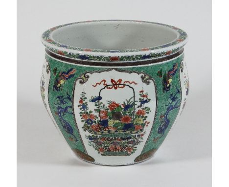 A ceramic fish bowl, possibly Samson of Paris, in the Chinese famille verte style, decorated with panels of flowers in basket