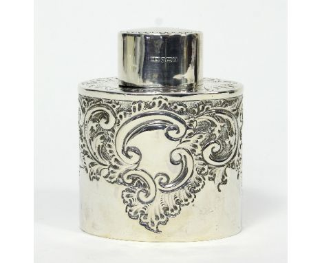 An oval silver tea caddy, Henry Wilkinson, Sheffield 1902, with scroll embossed decoration, 9cm high, approximately 105gm