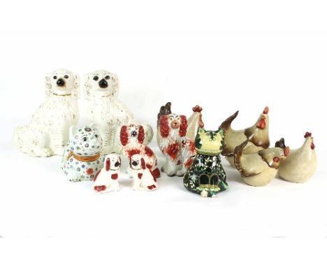 A pair of Staffordshire dogs highlighted in gilt, 29cm high, other Staffordshire dogs, ceramic chickens etc.
