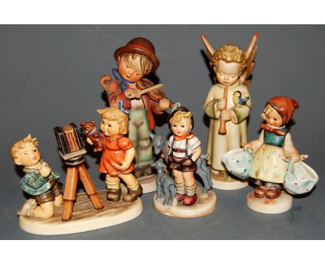 Five various Hummel figures, to include; Camera Ready and the Fiddler    Condition Report / Extra Information  Girl with two 