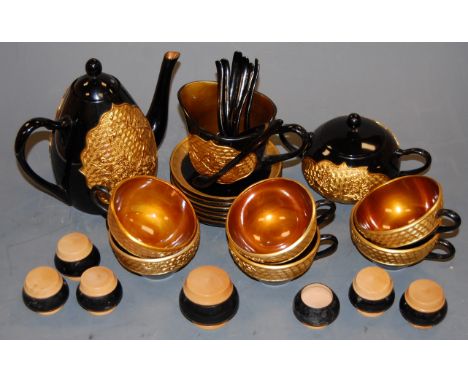 A Japanese black lacquered and gilt decorated six-place setting tea service