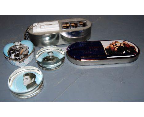 Musical interest, to include; Elvis Presley paperweights, trinket box, Take That pocket action movie in case etc (4)