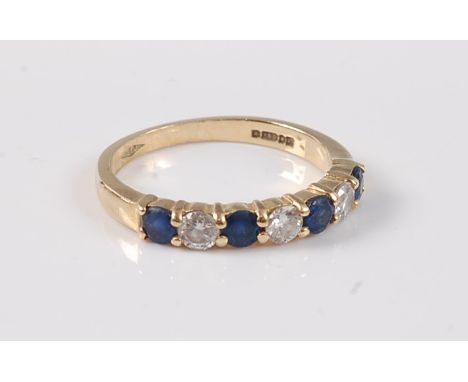 An 18ct sapphire and diamond ring, the alternating round sapphires and brilliant cut diamonds, total estimated approx. 0.30ct