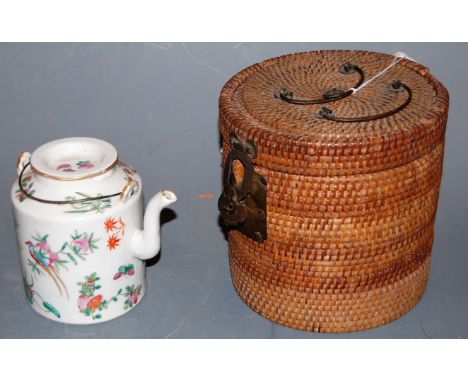 A Chinese glazed stoneware teapot in wicker case   Condition Report / Extra Information  Lid with light wear.Teapot with rest