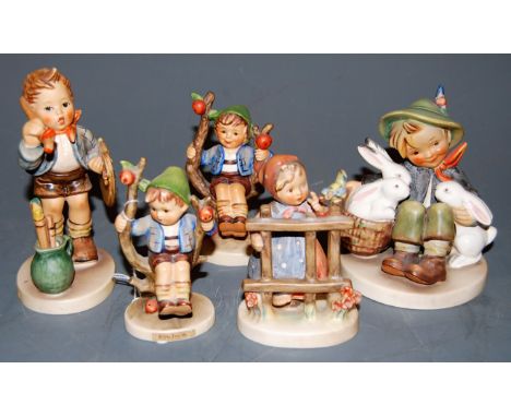 Five various Hummel figures, to include Appletree Boy    Condition Report / Extra Information  Appletree boy - break across m