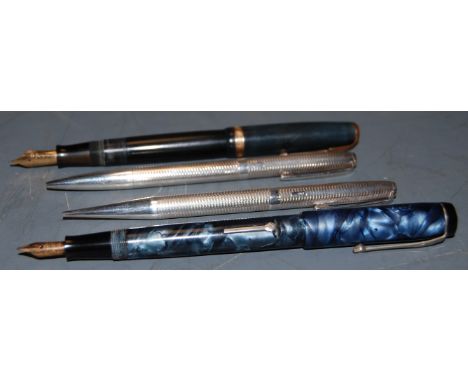 A Conway Stuart 'The Universal' fountain pen, having 14ct gold nib; together with a parker Duofold fountain pen, and a silver