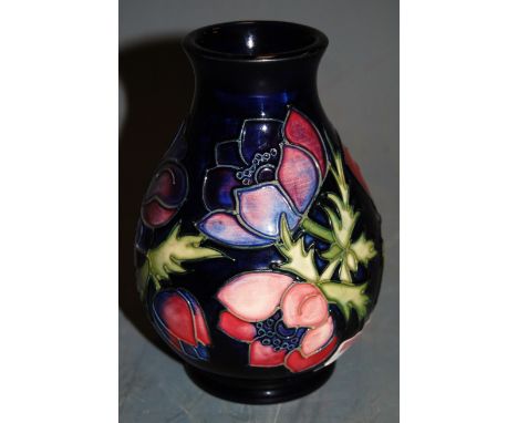 A modern Moorcroft pottery vase ***in the anemone pattern***, of baluster form, impressed marks and numbered 34/94, h.13.5cm 